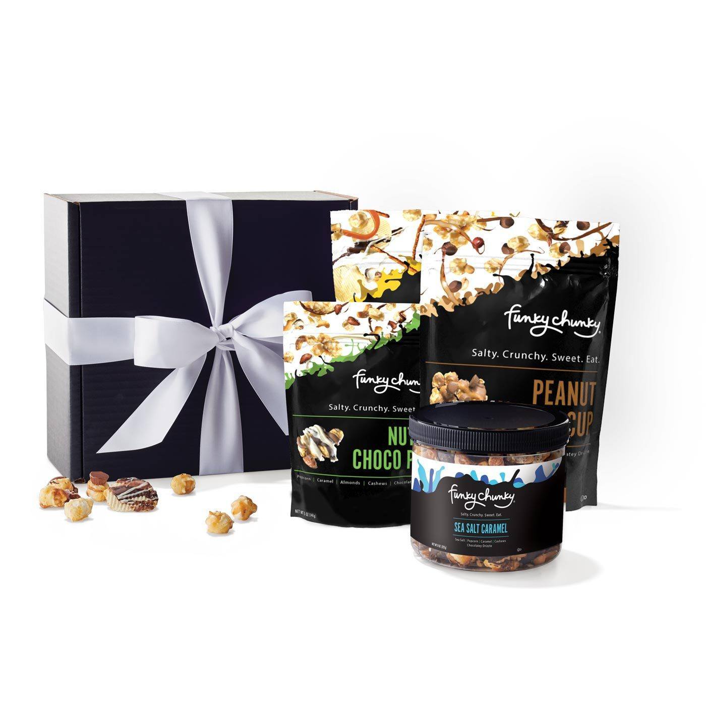 The Choir Gift-Different tones, different notes...it all makes for good music. The Choir is a Gift Pack ideal for a group: staff, colleagues, clients. A single 2 oz bag of Nutty Choco Pop, one 5 oz resealable bag each of Peanut Butter Cup and Chip Zel Pop and finally an 8 oz tub of Sea Salt Caramel. One 2 oz bag + two 5 oz bags + one 8 oz canister.-Funky Chunky